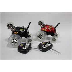 PAIR OF 'THUNDER TUMBLER' REMOTE CONTROL CARS
