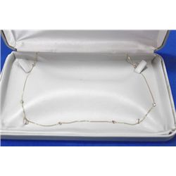 10 KT GOLD DIAMOND NECKLACE (0.58 CT)