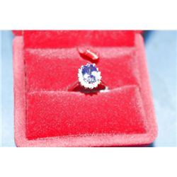 14 KT GOLD TANZANITE AND DIAMOND(0.14CTS) RING