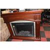 Image 1 : WOOD AND STONE FIREPLACE W ELECTRIC INSERT