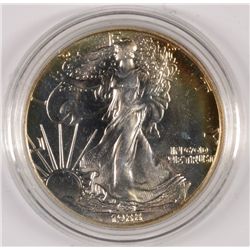 1988  GEM BU AMERICAN SILVER EAGLE IN CAPSULE WITH  DISPLAY BOX WITH CERTIFICATE