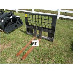 Pallet forks for skid loader