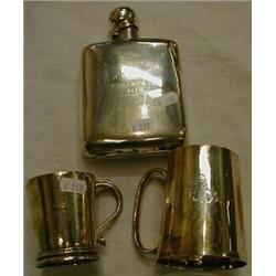 Inscribed silver hip flask and two silver mugs. £40-60