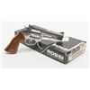 Image 1 : Rossi Model 971 DA revolver, .357 Magnum cal., 4”  barrel, stainless, checkered wood combat grips,