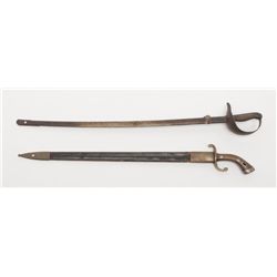 Lot of 2 swords with scabbards, both marked  Toledo; first, a D-guard with engraved blade with  pane