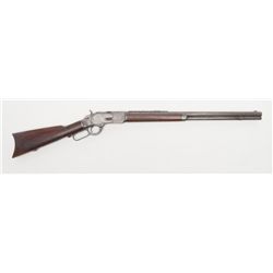 Winchester Model 1873 lever action rifle, .44  W.C.F. cal., 24” octagon barrel, blue finish,  7-leaf