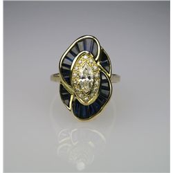 Cartier Style Blue Sapphire and Diamond Ring with  0.40 carat marquise cut diamond with F-G color an