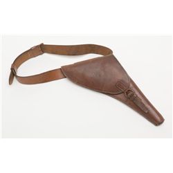 Pebble finish brown leather British flap holster  and belt fitting a 7-1/2” SAA in minty condition.