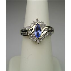 Elegant Tanzanite and Diamond Ring with marquise  cut Tanzanite weighing approx. 0.80 carats with 34