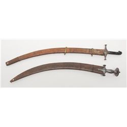 Lot of 2 mid-eastern swords with scabbards  including a curved blade type, approx. 35” overall  with