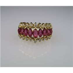 Ruby and Diamond Ring with 9 marquise cut Rubies  weighing approx. 2.00 carats total with 18 round