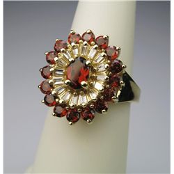 Striking Red Garnet and Diamond Ring with 17  channel set garnets weighing approx. 2.00 carats  and