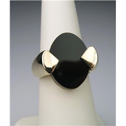 Dramatic Contemporary Black Onyx Ring with oval  shaped Onyx set in modern 14 karat yellow gold  set