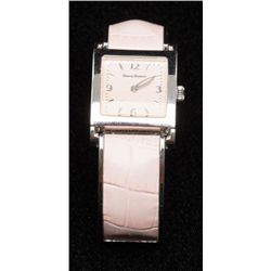 One Tommy Bahama ladies designer wrist watch with  pink dial and pink band.  Est.:  $150 - $200