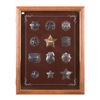Image 1 : Framed display containing 12 high quality  reproduction badges in sterling silver copied from  famou