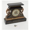 Image 1 : Romantic style mantle clock with fancy metal  mounts and onyx base showing Angels at sides and  doub