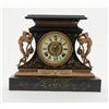 Image 2 : Romantic style mantle clock with fancy metal  mounts and onyx base showing Angels at sides and  doub