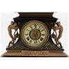 Image 3 : Romantic style mantle clock with fancy metal  mounts and onyx base showing Angels at sides and  doub