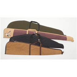 Lot of 8 misc. soft long arm gun cases in fair to  good condition.   Est.:  $50-$75.