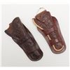 Image 1 : Lot of 2 carved/tooled leather Heiser brand  holsters for SAA revolvers, both in overall good  condi