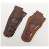 Image 2 : Lot of 2 carved/tooled leather Heiser brand  holsters for SAA revolvers, both in overall good  condi