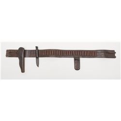 A great frontier rig consisting of a heavy wide  leather cartridge belt with double buckles, slim  J
