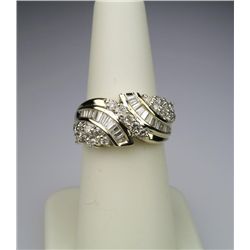 Sensational Diamond Ring with 21 round and 28  baguette cut Diamonds weighing approx. 1.60 -2.00  ca