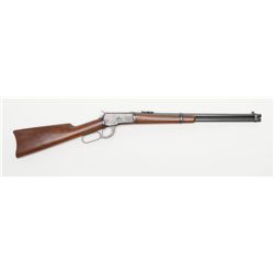 Winchester Model 1892 lever action SRC, .38 W.C.F.  cal., 20” barrel, blue finish, wood stocks,  #25