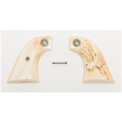 Pair of raised carved steer head ivory medallion  grips for a Colt SAA revolver in very good  condit