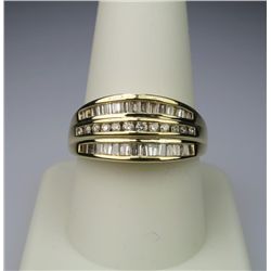 Dazzling Diamond Ring channel set with 12 round  and 34 baguette cut Diamonds weighing approx.  1.20