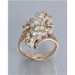 One 14 k yellow gold ladies diamond cluster ring  with 27 fine quality diamonds weighing approx. 2