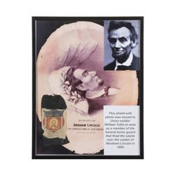 Frame display of Lincoln artifacts consisting of  funerary badge with small photo on cardboard of  L