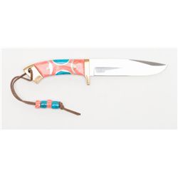 Custom-made one-of-a-kind knife with turquoise and  coral grip scales showing silver accents and  ch
