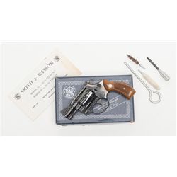 Smith & Wesson Model 34-1 DA revolver, .22LR cal.,  2” barrel, blue finish, checkered wood medallion