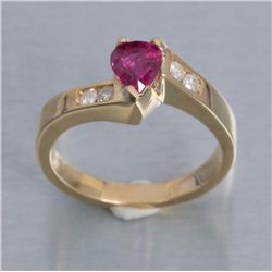 One 14k yellow gold ring set with a fine heart  shaped ruby weighing 1ct and diamonds.  Est.:   $1,0