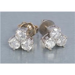 A pair of 3 diamond studs weighing approx 1ct in  14 k yellow gold, diamonds are approx H color and