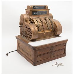 Large commercial size brass cash register, circa  WW I, approx. 26” in height (including oak base  w