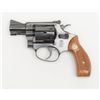 Image 3 : Smith & Wesson Model 34-1 DA revolver, .22LR cal.,  2” barrel, blue finish, checkered wood medallion