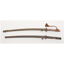 Lot of 2 Japanese Katana length swords with  military metal scabbard; first shows a cleaned  blade w