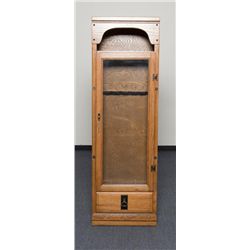 Custom 7 gun cabinet with a reddish stain in very  good condition, approx. 66” x 26” x 11” overall;