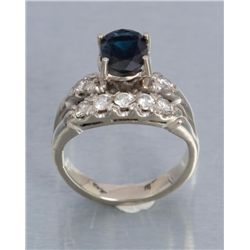 Natural oval sapphire in unmarked white gold mount  with approx.  ½ CT diamonds.    Est.:  $175-$350
