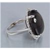 Image 4 : One white gold ring set with a large Smokey topaz  cabochon weighing approx.    30.00 cts.  Est.: