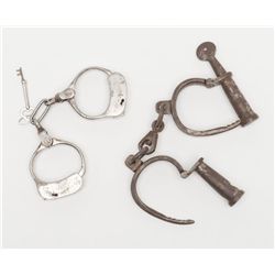 Lot of 2 pairs of handcuffs, both with keys and  both working at time of description; one pair is  i