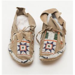 Pair of beaded American Indian moccasins, blue,  white, orange and green, some slight bead losses  b