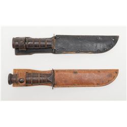 Lot of 2 KA-BAR style knives with leather sheaths,  one marked “US UTICACUTCO” with black leather  s