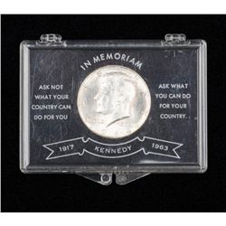 7 half dollar Kennedy silver coins 1 mint 1964 and  3 Ike dollars not silver.   Silver value approx