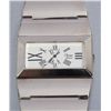 Image 2 : One unique ladies 2” wide wrist watch with a  rectangle face and roman numerals could be silver.   E