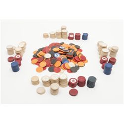 Large lot of antique poker chips, some with sun  signs approximately 140 pieces.  Est.:  $100-$200.