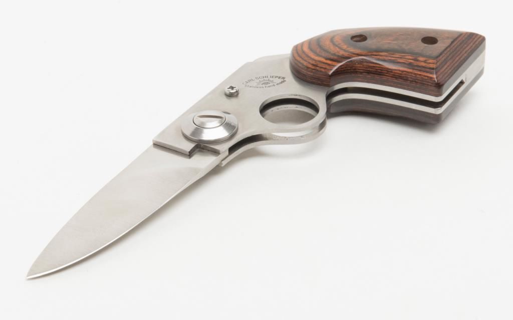 Knife lot including a Carl Schlieper stainless handmade folding blade