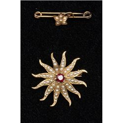 One beautiful Victorian brooch and pin set in 14 k  yellow gold set with real pearls and a garnet.